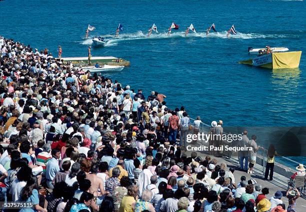 Crowd gathers at the lakeshore to watch Tommy Bartlett's water show, Chicago, Illinois, 1980s.