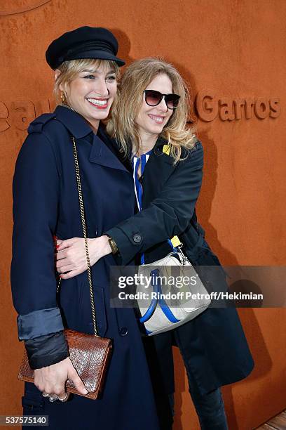 Actresses Pauline Lefevre and Pascale Arbillot attend Day Twelve of the 2016 French Tennis Open at Roland Garros on June 2, 2016 in Paris, France.