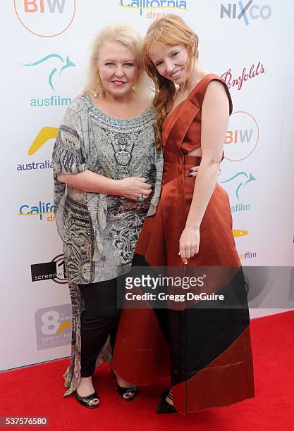 Actors Denise Roberts and Stef Dawson arrive at Australians In Film Heath Ledger Scholarship Dinner on June 1, 2016 in Beverly Hills, California.