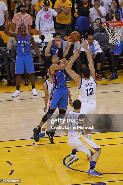 Andre Roberson of the Oklahoma City Thunder drives to the basket against the Golden State Warriors in Game Five of the Western Conference Finals...