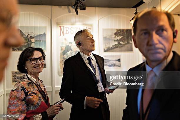 Peter Brabeck-Letmathe, chairman of Nestle SA, center, and Paul Bulcke, chief executive officer of Nestle SA, right, attend a 150th anniversary event...