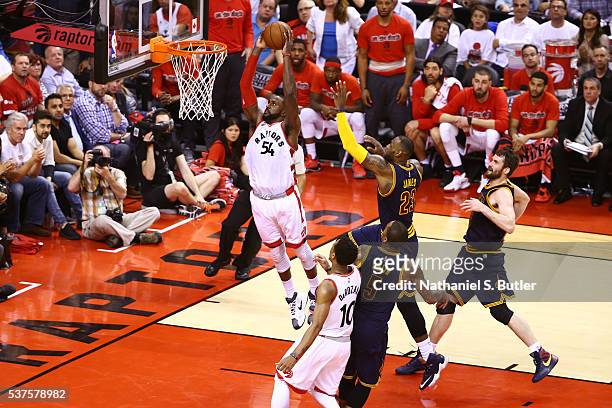 Patrick Patterson of the Toronto Raptors dunks the ball against the Cleveland Cavaliers during Game Six of the NBA Eastern Conference Finals at Air...