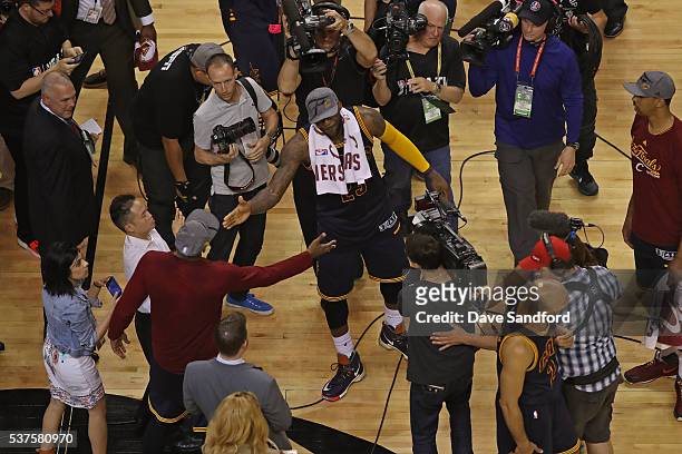 Smith and LeBron James of the Cleveland Cavaliers shake hands after winning Game Six of the NBA Eastern Conference Finals against the Toronto Raptors...