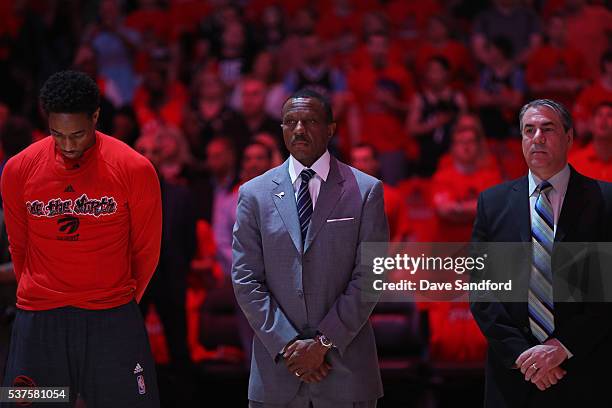 DeMar DeRozan, Dwane Casey and Andy Greer of the Toronto Raptors stand on the court before Game Six of the NBA Eastern Conference Finals against the...