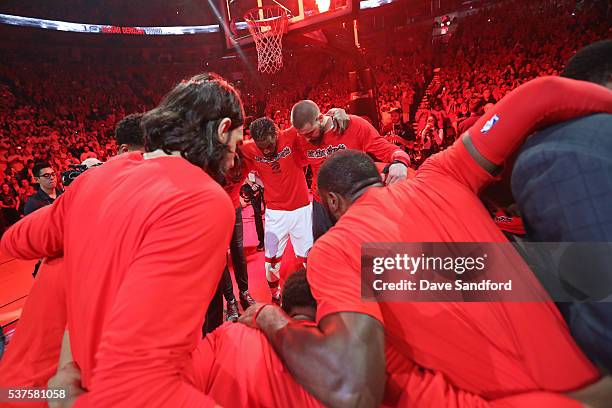 The Toronto Raptors huddle up before Game Six of the NBA Eastern Conference Finals against the Cleveland Cavaliers at Air Canada Centre on May 27,...