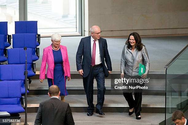 Parliamentary group leader of CDU/CSU Volker Kauder and German Labour and Social Minister Andrea Nahles are pictured prior a debate on recognition of...
