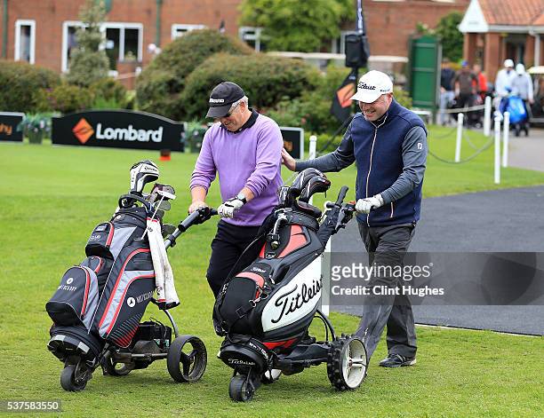 James Keeling and Adrian Ambler of Low Laithes Golf Club make their way down the first hole fairway during the PGA National Pro-Am North Qualifier at...