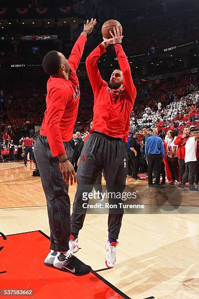 Jonas Valanciunas and Norman Powell of the Toronto Raptors warm up before Game Six of the NBA Eastern Conference Finals against the Cleveland...