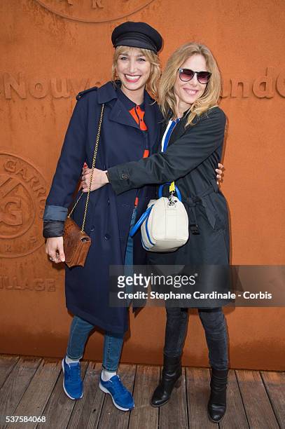 Actresses Pauline Lefevre and Pascale Arbillot attend day twelve of the 2016 French Open at Roland Garros on June 2, 2016 in Paris, France.