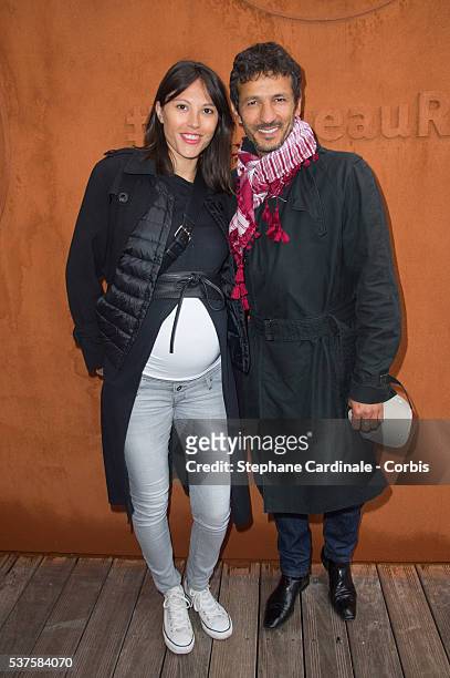 Actor Kamel Belghazi and his wife Marine Thierry attend day twelve of the 2016 French Open at Roland Garros on June 2, 2016 in Paris, France.