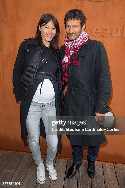 Actor Kamel Belghazi and his wife Marine Thierry attend day twelve of the 2016 French Open at Roland Garros on June 2, 2016 in Paris, France.