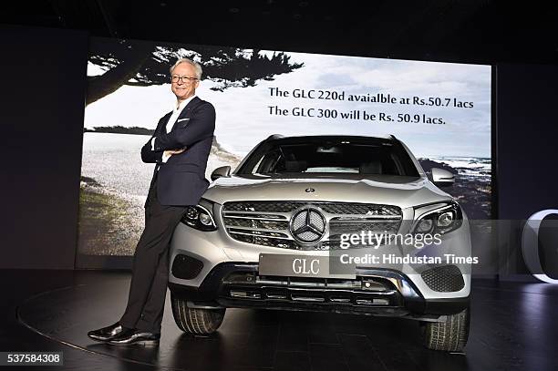 Roland S. Folger, Managing Director and CEO, Mercedes-Benz India, poses with the company’s GLC model during its launch on June 2, 2016 in New Delhi,...