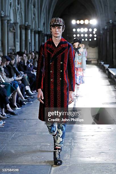 Model walks the runway during the Gucci Cruise 2017 fashion show at the Cloisters of Westminster Abbey on June 2, 2016 in London, England.