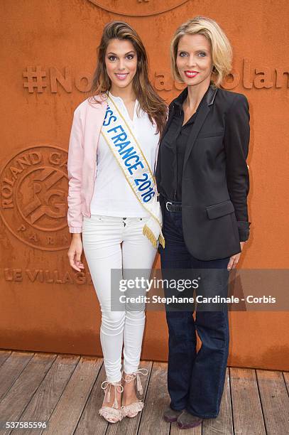 Iris Mittenaere and Sylvie Tellier attend day twelve of the 2016 French Open at Roland Garros on June 2, 2016 in Paris, France.