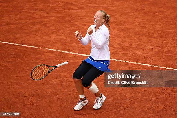 Kiki Bertens of Netherlands celebrates victory during the Ladies Singles quarter final match against Timea Bacsinszky of Switzerland on day twelve of...