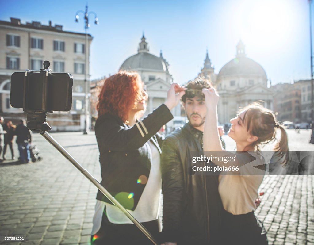 Friends taking a selfie stick in Rome