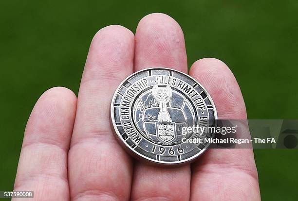 View of a specially commissioned Royal Mint 1966 £5 coin to be used at the coin toss prior to the International Friendly match between England and...