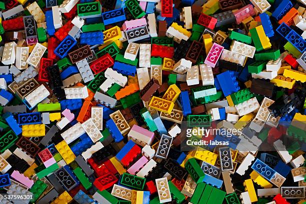 pile of colorful lego bricks. - lego stock pictures, royalty-free photos & images