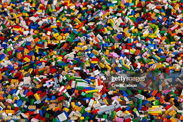 pile of colorful lego bricks. - lego blocks stock pictures, royalty-free photos & images