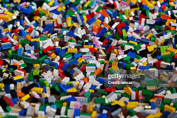 pile of colorful lego bricks. - lego stockfoto's en -beelden