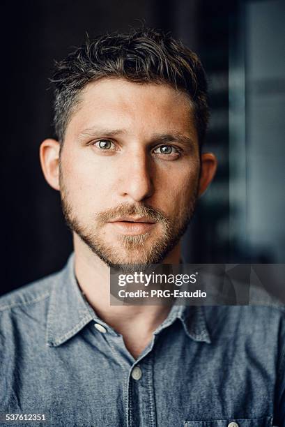 young man inside a industrial location - gypsy stock pictures, royalty-free photos & images