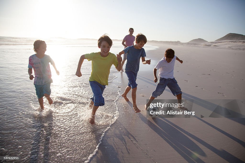 Children playing together on a beach