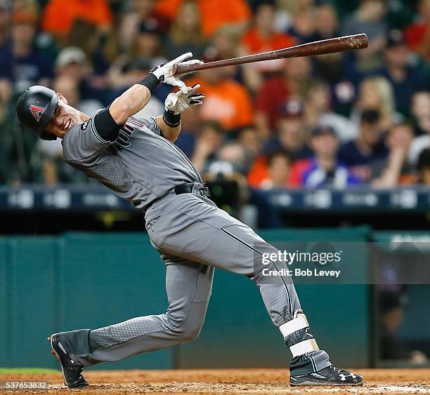 Jake Lamb of the Arizona Diamondbacks reacts after being hit by a pitch from Dallas Keuchel of the Houston Astros in the seventh inning at Minute...
