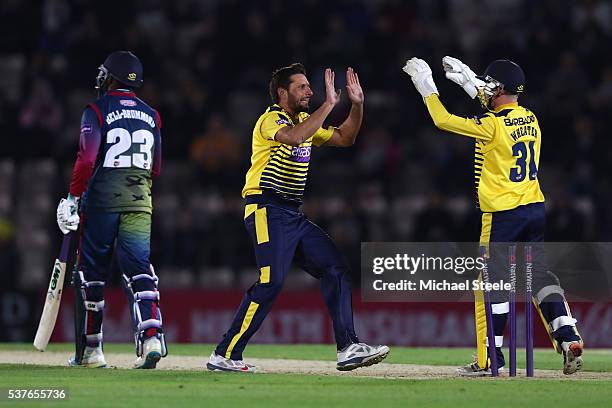 Shahid Afridi of Hampshire celebrates capturing the wicket of Daniel Bell-Drummond of Kent stumped by wicketkeeper Adam Wheater during the NatWest...