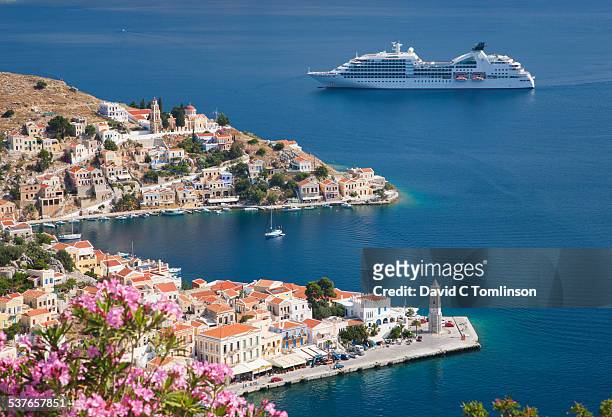 view over harani bay, gialos, symi, greece - greek islands fotografías e imágenes de stock