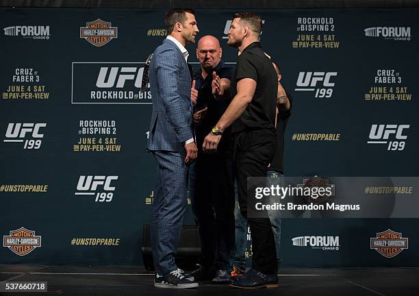 Middleweight champion Luke Rockhold and Michael Bisping face off during the UFC 199: Press Conference at the Forum on June 2, 2016 in Inglewood,...