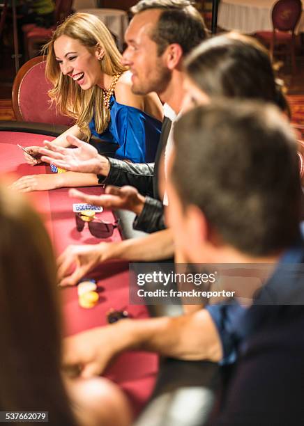 friends playing at poker at casino - the beat the chic party stock pictures, royalty-free photos & images