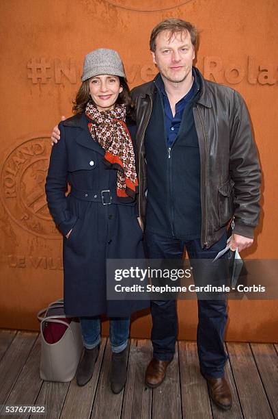 Actors Valerie Karsenti and her husband Francois Feroleto attend day twelve of the 2016 French Open at Roland Garros on June 2, 2016 in Paris, France.