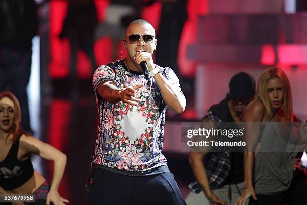 Rehearsal -- Pictured: Sean Paul and Wisin rehearse for the 2014 Billboard Latin Music Awards, from Miami, Florida at the BankUnited Center,...