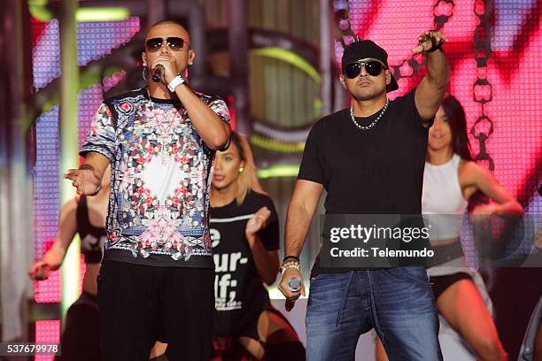 Rehearsal -- Pictured: Wisin and Sean Paul rehearse for the 2014 Billboard Latin Music Awards, from Miami, Florida at the BankUnited Center,...