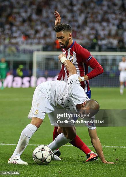 Pepe of Real Madrid in action with Yannick Carrasco of Club Atletico de Madrid during the UEFA Champions League Final between Real Madrid and Club...