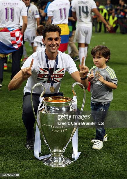 Alvaro Arbeloa of Real Madrid celebrates with the trophy following the UEFA Champions League Final between Real Madrid and Club Atletico de Madrid at...