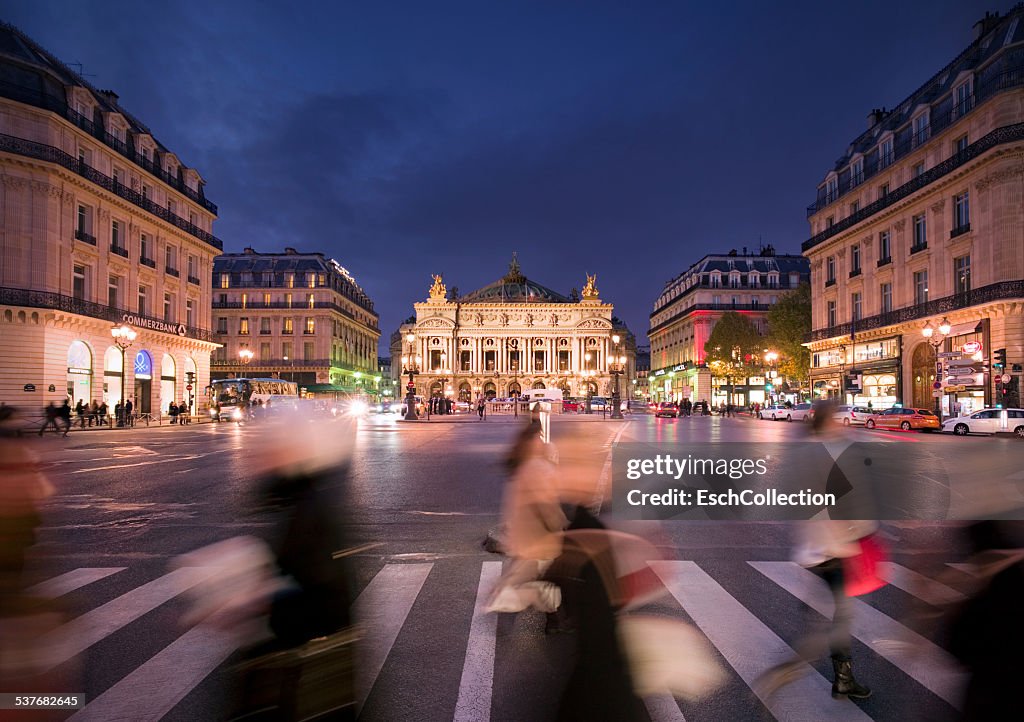 People crossing street at Place de l'Opera, Paris
