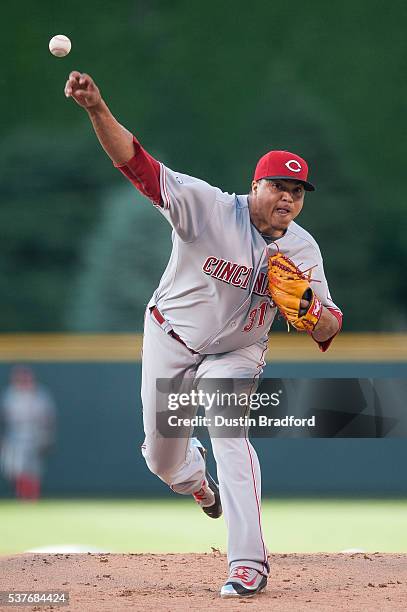 Alfredo Simon of the Cincinnati Reds pitches against the Colorado Rockies in the first inning of a game at Coors Field on June 2, 2016 in Denver,...