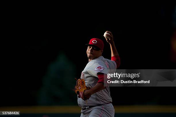 Alfredo Simon of the Cincinnati Reds pitches against the Colorado Rockies in the first inning of a game at Coors Field on June 2, 2016 in Denver,...