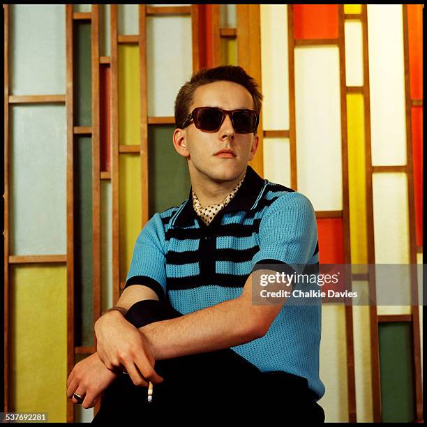 English singer Terry Hall, of ska revival band The Specials, photographed in a bar during the shoot for the cover of the group's second LP, 'More...