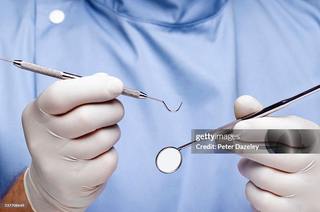 Dentist doing dental examination