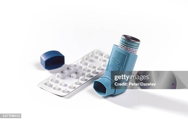 blue asthma inhaler and steroids - asthma-inhaler-spray stock pictures, royalty-free photos & images