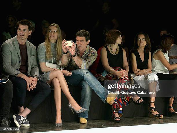 Nicole Kimpel and Antonio Banderas attend the Fisico Fashion Show during Miami Fashion Week at Ice Palace on June 2, 2016 in Miami, Florida.