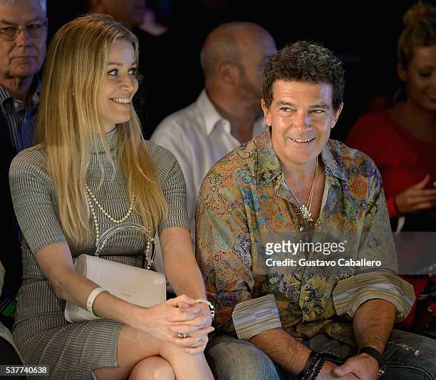 Nicole Kimpel and Antonio Banderas attend the Fisico Fashion Show during Miami Fashion Week at Ice Palace on June 2, 2016 in Miami, Florida.