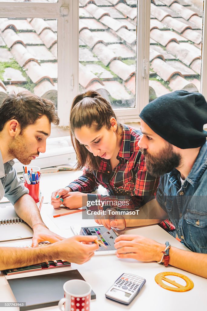 Working together with a tablet in office