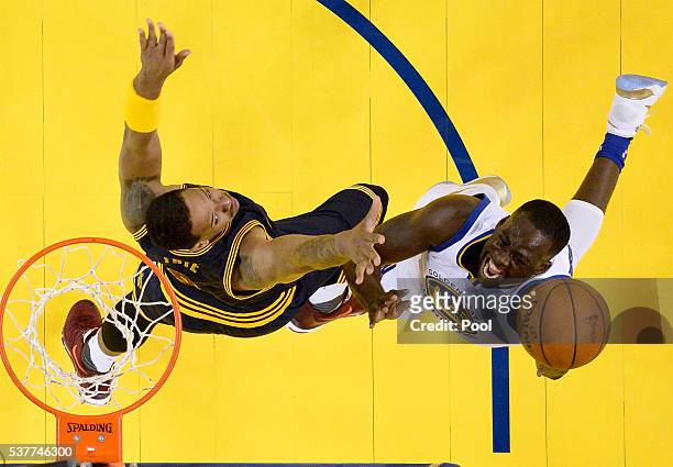 Draymond Green of the Golden State Warriors goes up for a shot against Channing Frye of the Cleveland Cavaliers in Game 1 of the 2016 NBA Finals at...