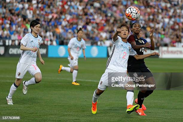 Saori Ariyoshi of Japan and Crystal Dunn of United States of America vie for control of the ball during an international friendly match at Dick's...