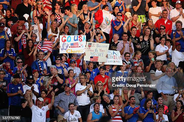 Fans support the United States Women's National Soccer Team as they face Japan during an international friendly match at Dick's Sporting Goods Park...