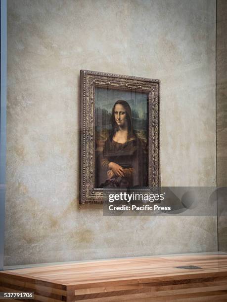 Leonardo da Vinci's portrait of Lisa Gherardini, wife of Francesco del Giocondo, known as the Mona Lisa . The Louvre Museum in Paris considered as...