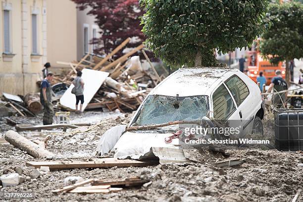 Car and twisted trees are stuck in mud following floods on June 3, 2016 in Simbach am Inn, Germany. Severe and sudden flooding in the region around...